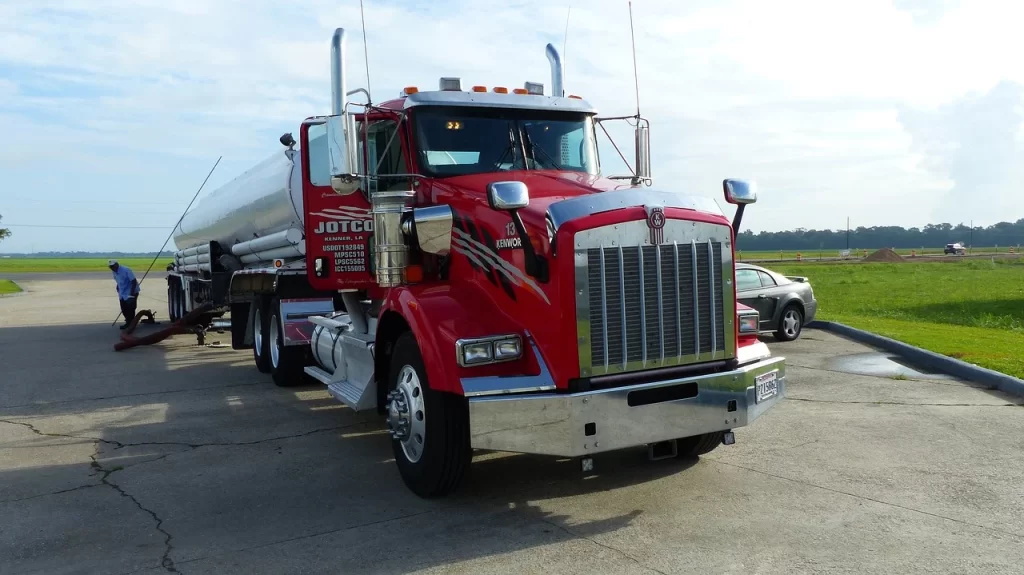 red truck with white trailer