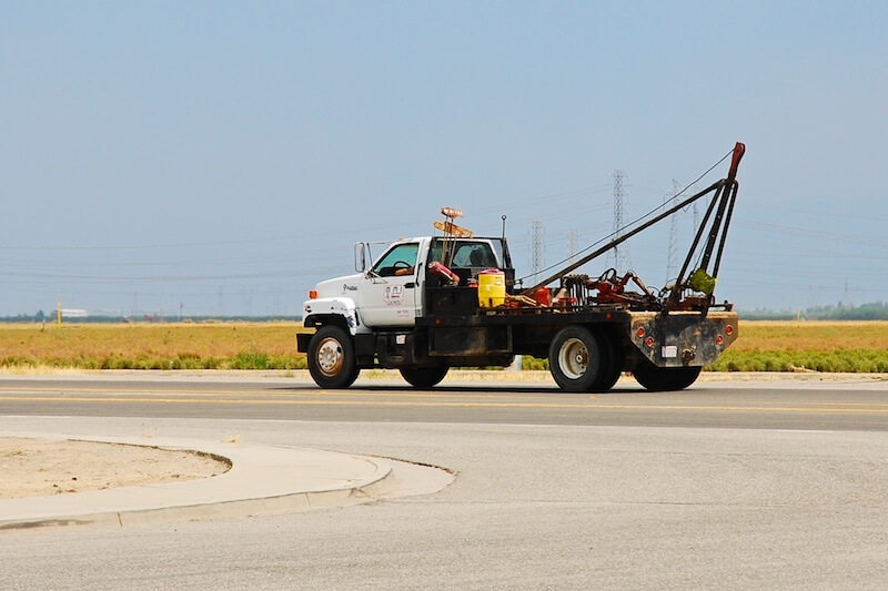 a tow truck on a highway