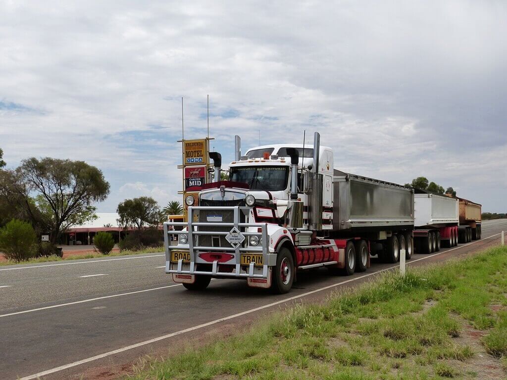 Truck with three trailers