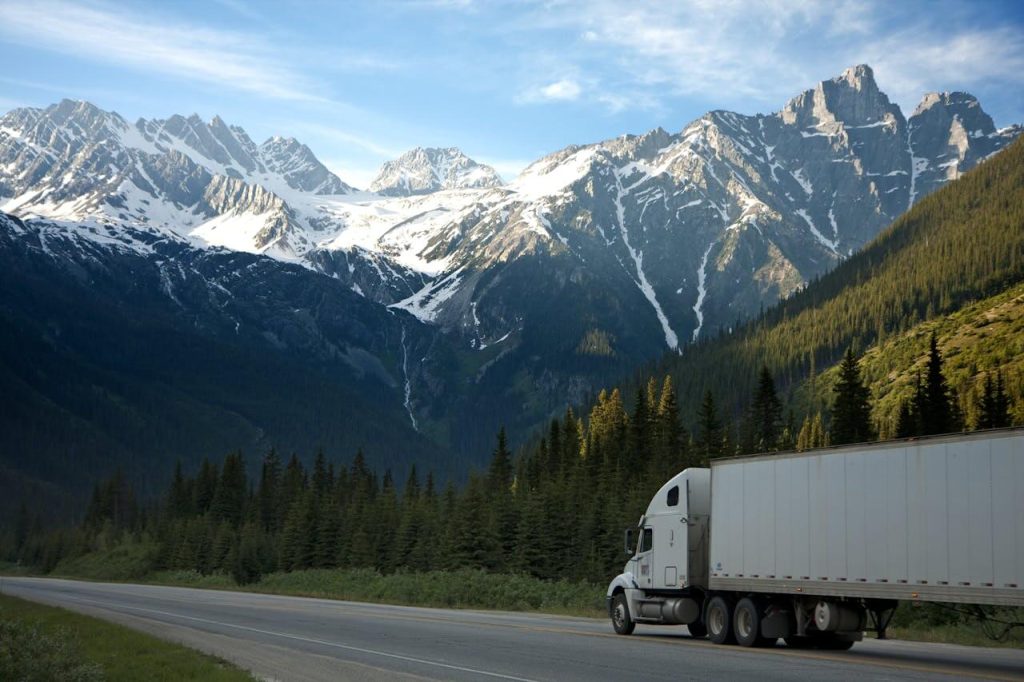 Truck against the backdrop of the mountains