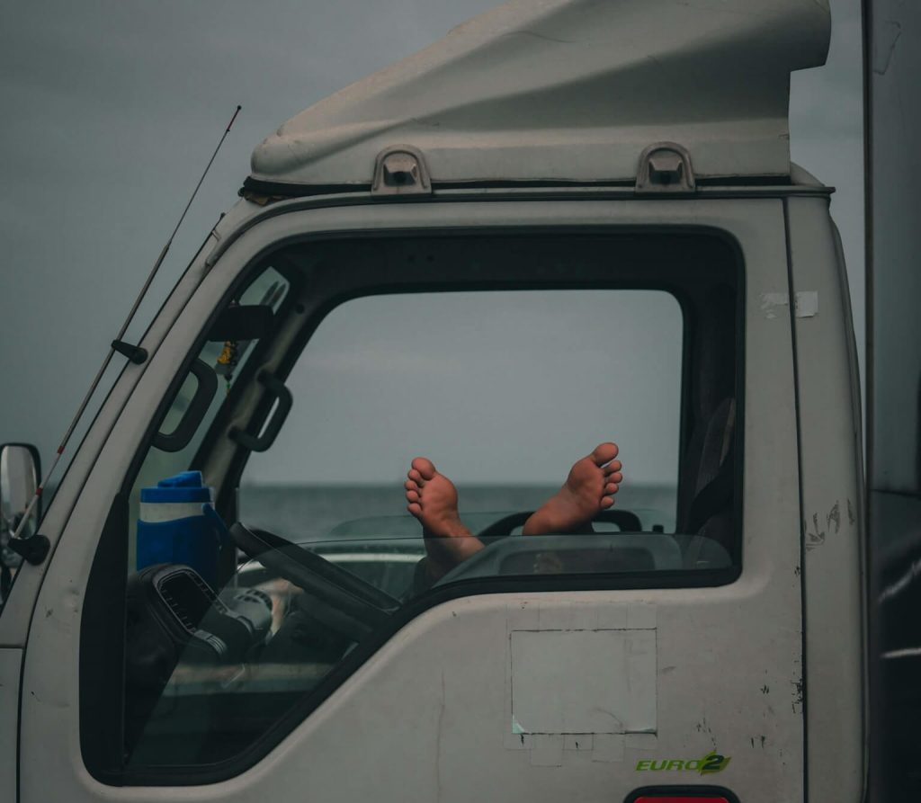 truck driver sleeping in cab