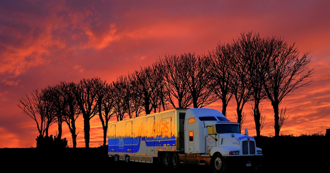 transport truck at sunset