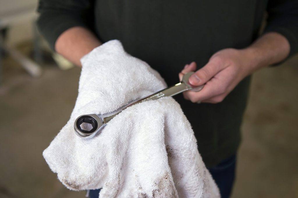 man holding spanner