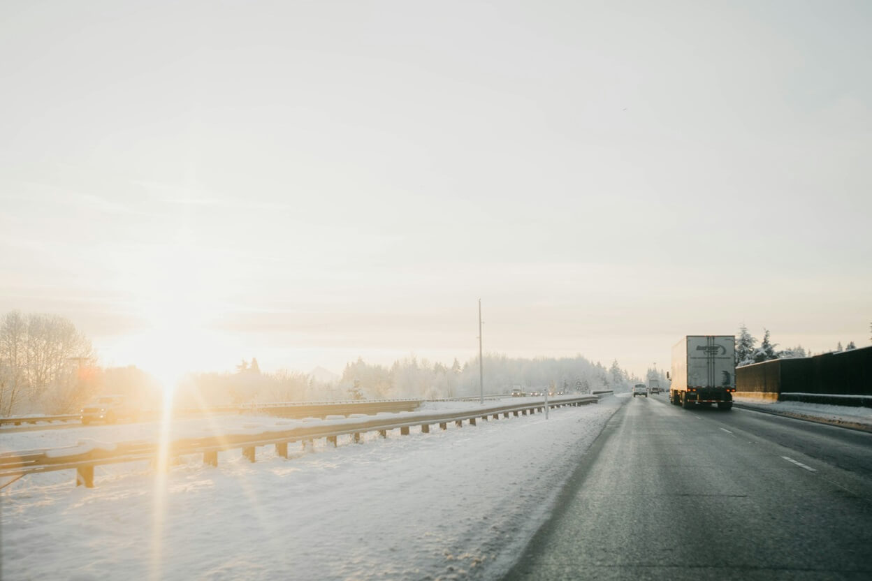 truck on a road during winter