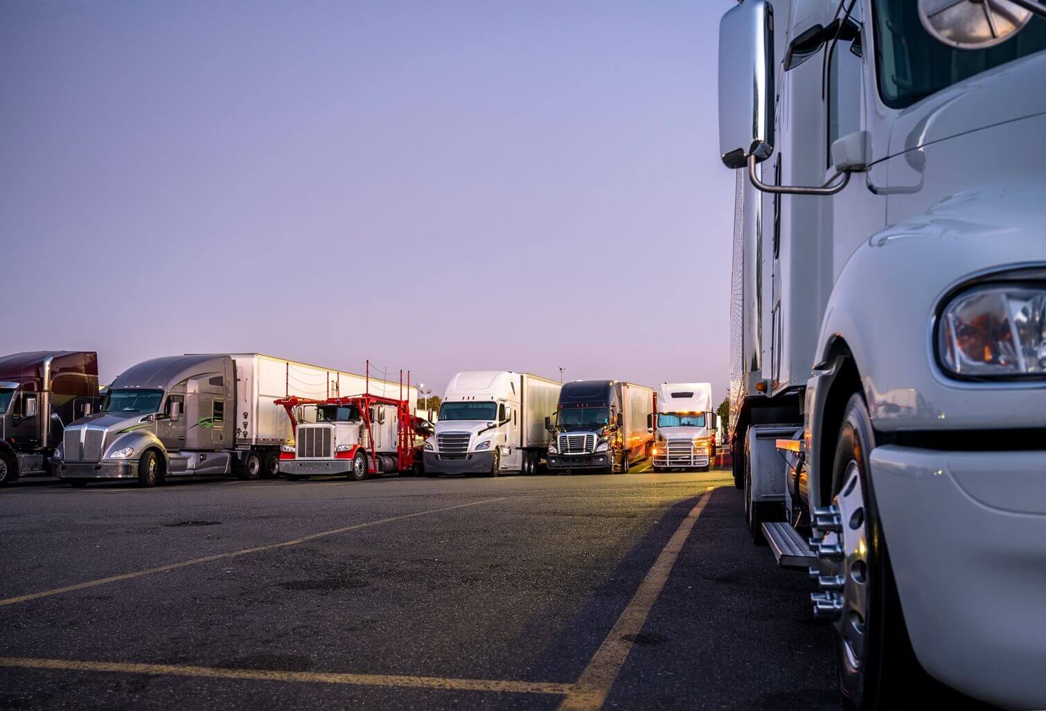 semi-trucks at night truck stop