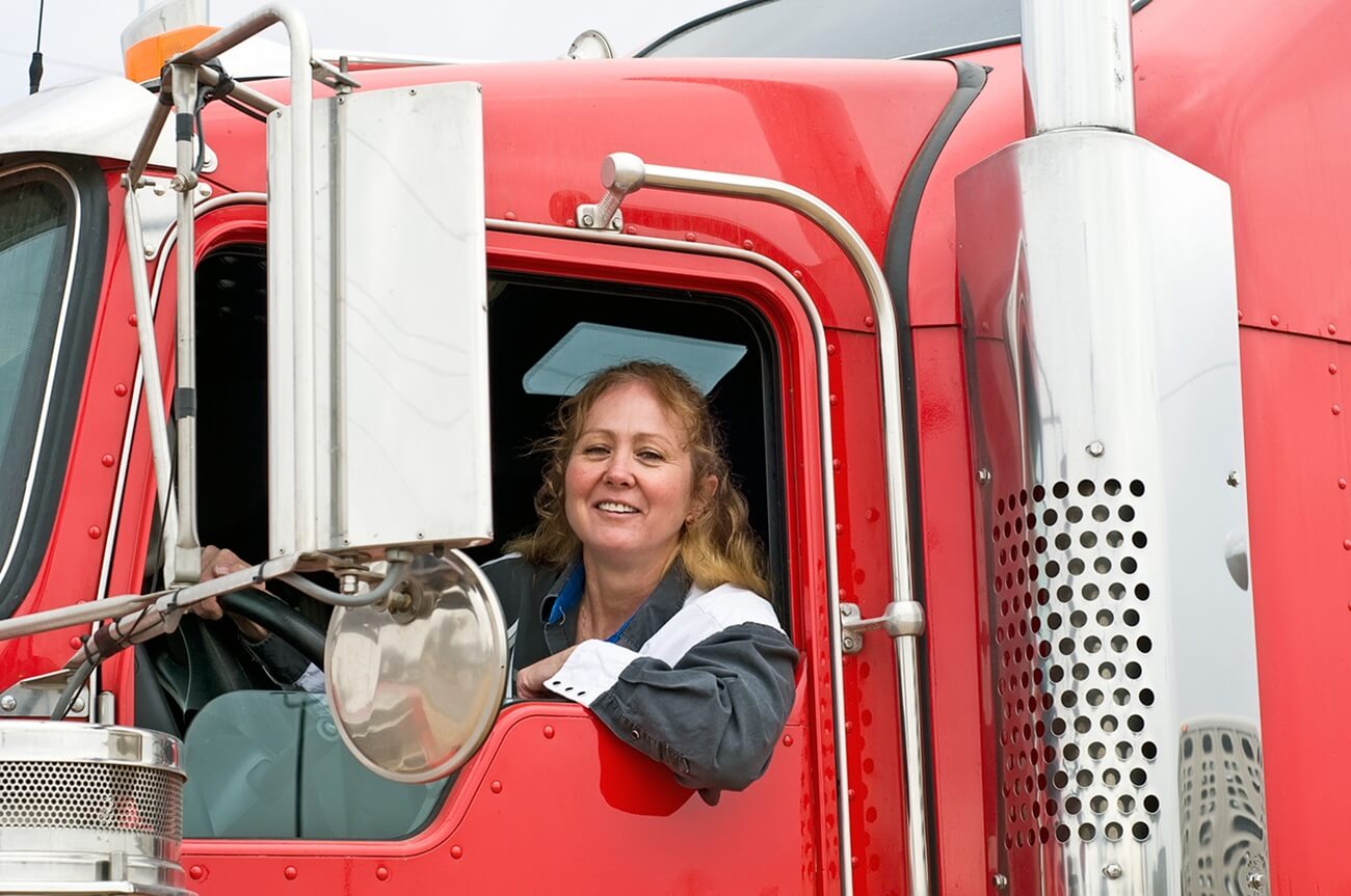 female truck driver in a truck